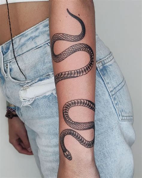 wrap around snake tattoo arm|226+ Snake Wrapped Around Arm Tattoo Ideas